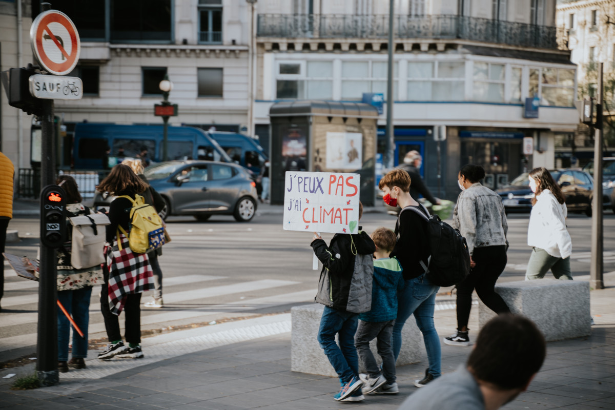 Photo shows student climate protest in Paris in 2021. Photo: Mat Napo on Unsplash. 