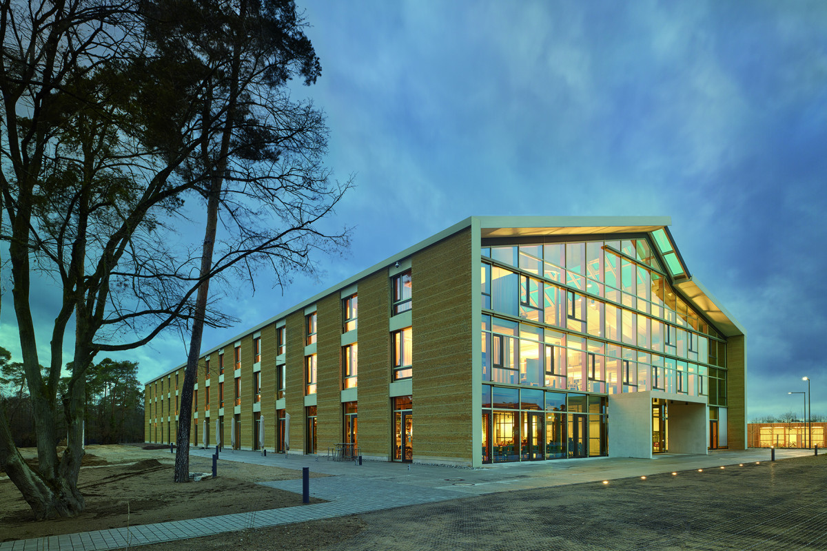 Another building showcasing what is possible with clay construction is the Alnatura Campus in Darmstadt, south of Frankfurt. Europe's largest office building made of clay, the base of the organic food retailer can host 500 employees and won the 2019 Clay Building Award. Photo: Roland Halbe/Alnatura. Another building showcasing what is possible with clay construction is the Alnatura Campus in Darmstadt, south of Frankfurt. Europe's largest office building made of clay, the base of the organic food retailer can host 500 employees and won the 2019 Clay Building Award. Photo: Roland Halbe/Alnatura.