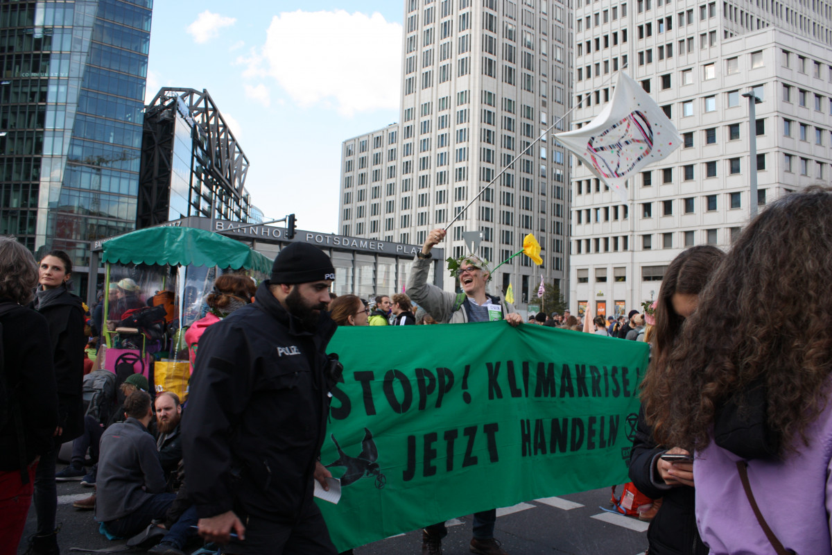 Climate activist at Extinction Rebellion's occupation of Potsdamer Platz on 7 October. Photo: CLEW/Eriksen